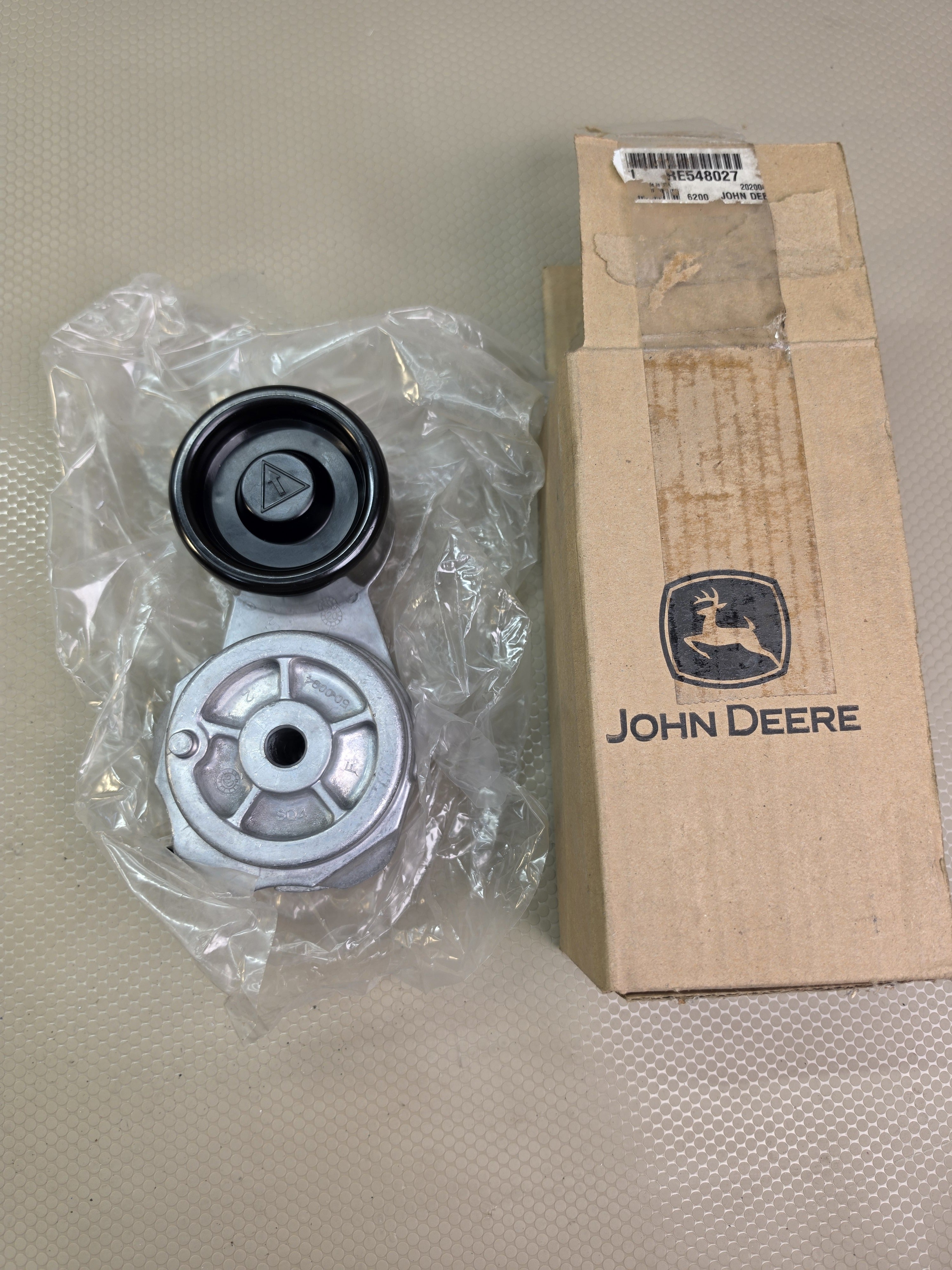 JOHN DEERE RE548027 Engine Auxiliary Drive Belt Tensioner Pulley New OEM