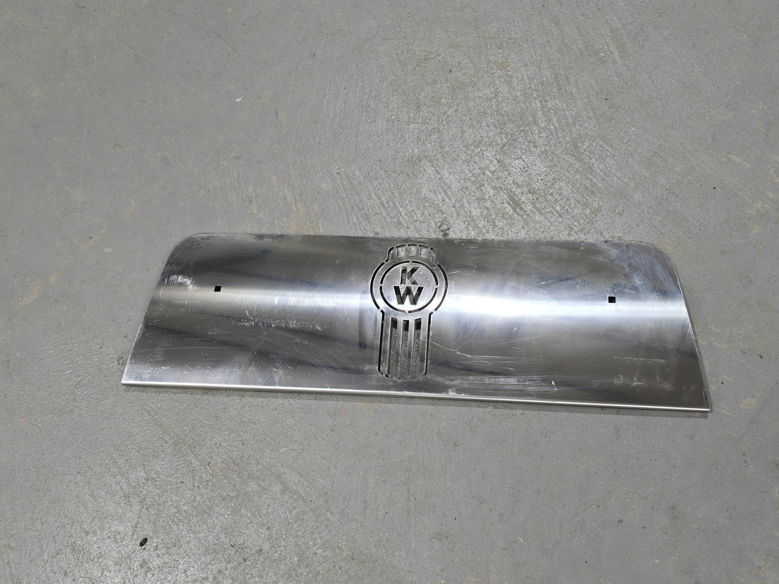 Kenworth MD1569 W900 W900L Stainless Steel Fender Guard Below Headlight KW Logo