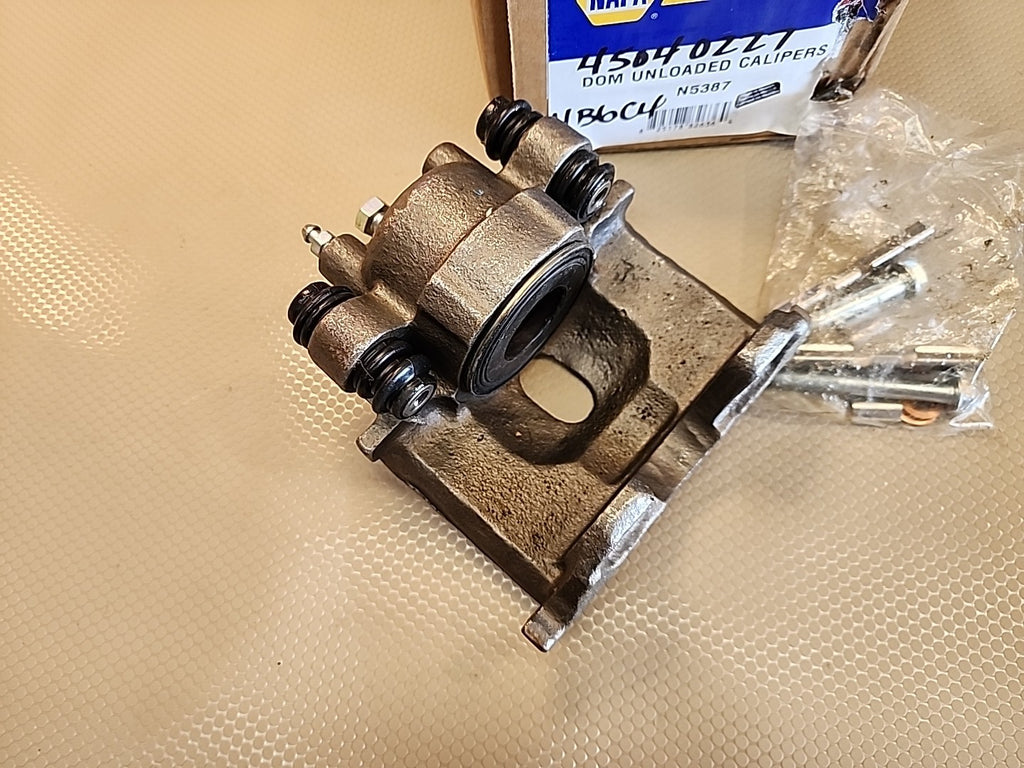 OEM Dom Unloaded Caliper N4898 Napa NEW