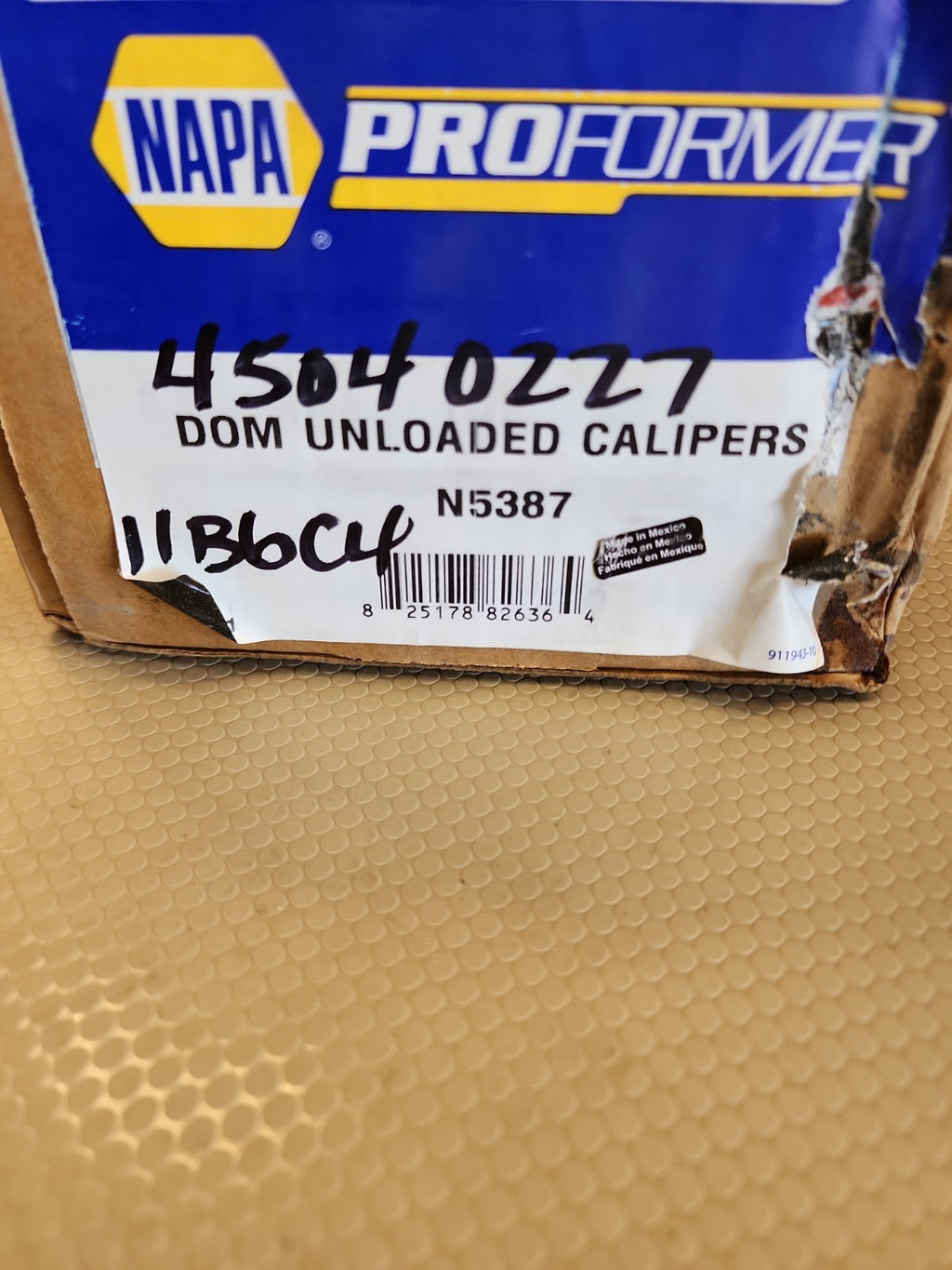 OEM Dom Unloaded Caliper N4898 Napa NEW