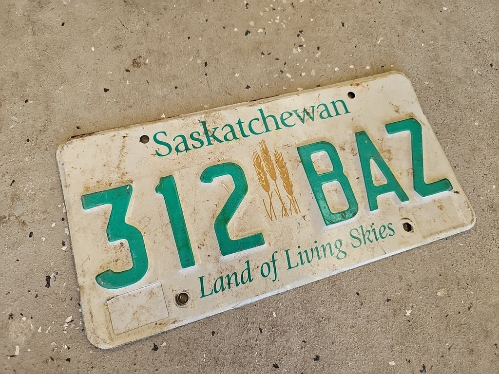 Saskatchewan Canada License Plate #799 JTY Wheat Sheaf Sheaves EXPIRED Aluminum 