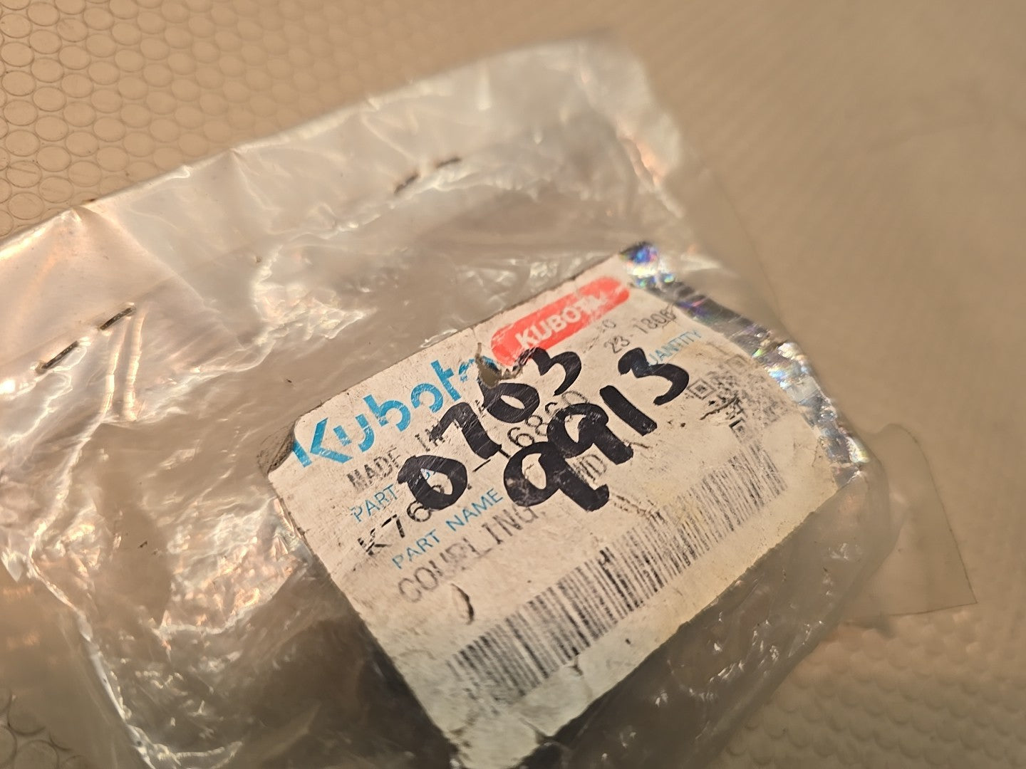 Kubota OEM K7621-16860 Coupling, FWD. New in package.