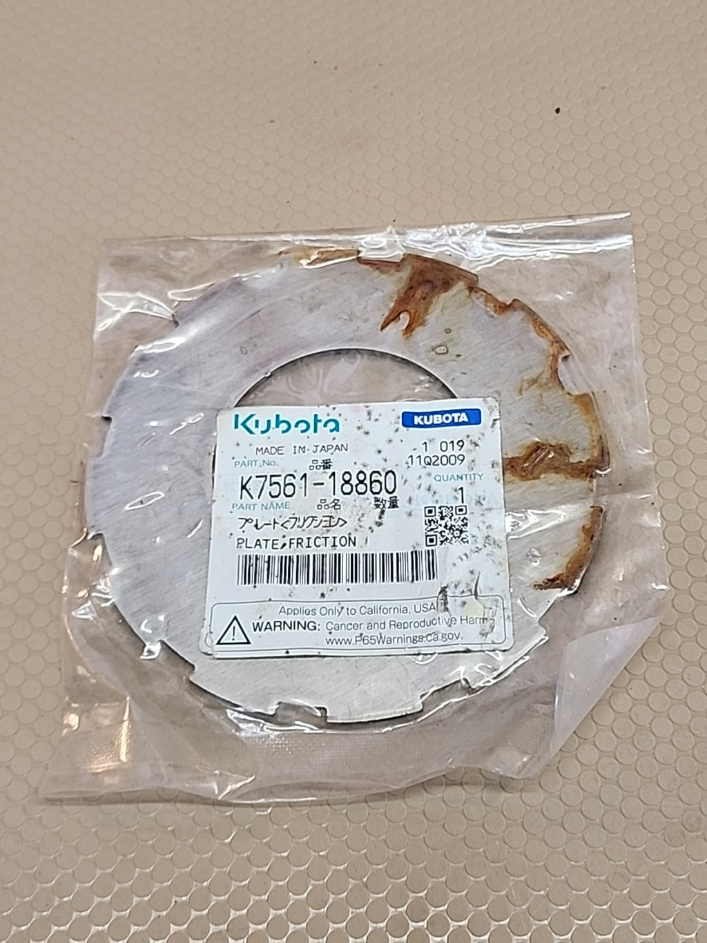 Kubota K7561-18860 Plate Friction OEM Tractor Part – New in Package