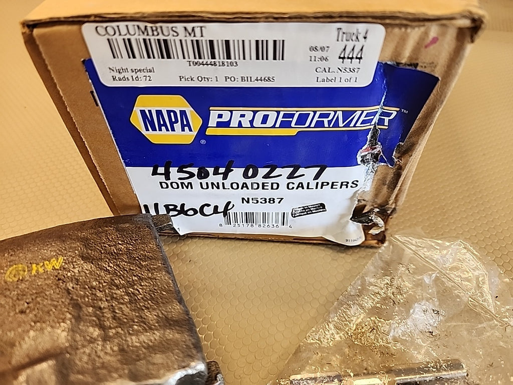 OEM Dom Unloaded Caliper N4898 Napa NEW
