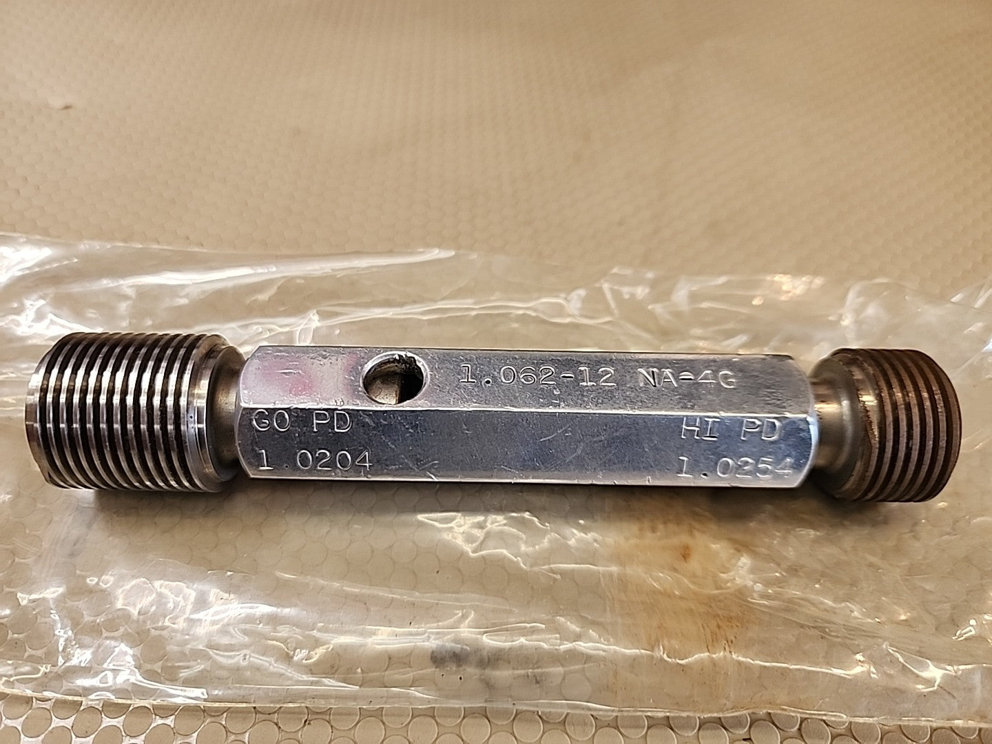 THE PIPE MACHINERY CO THREAD PLUG GAGE 1.062-12 NA-4G GO PD 1.0204 HI PD 1.0254