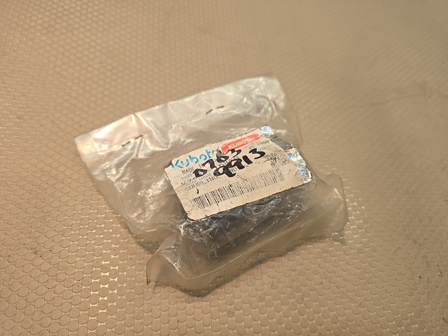 Kubota OEM K7621-16860 Coupling, FWD. New in package.