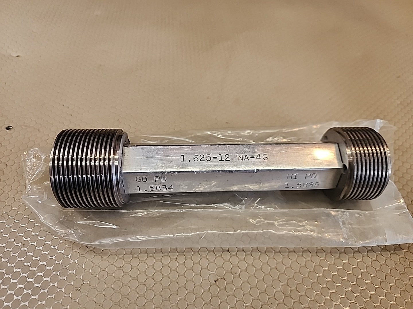 THE PIPE MACHINERY CO THREAD PLUG GAGE 1.625-12 NA-4G GO PD 1.5834 HI PD 1.5889