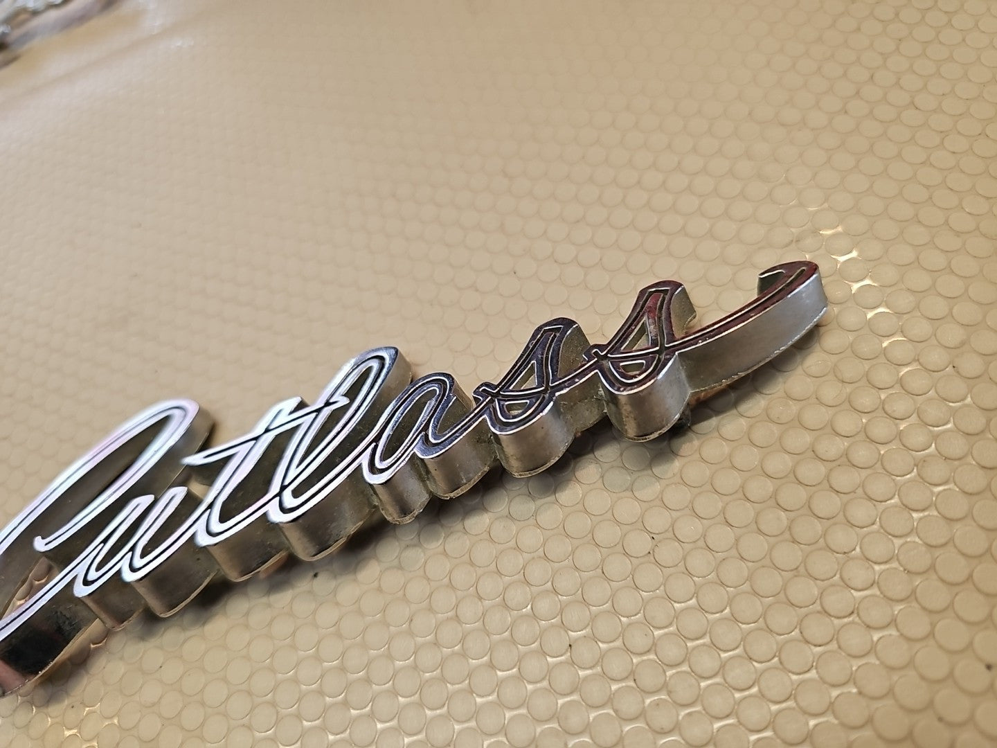 Original 1969 Oldsmobile Cutlass script emblem 399503 - Vintage OEM Badge