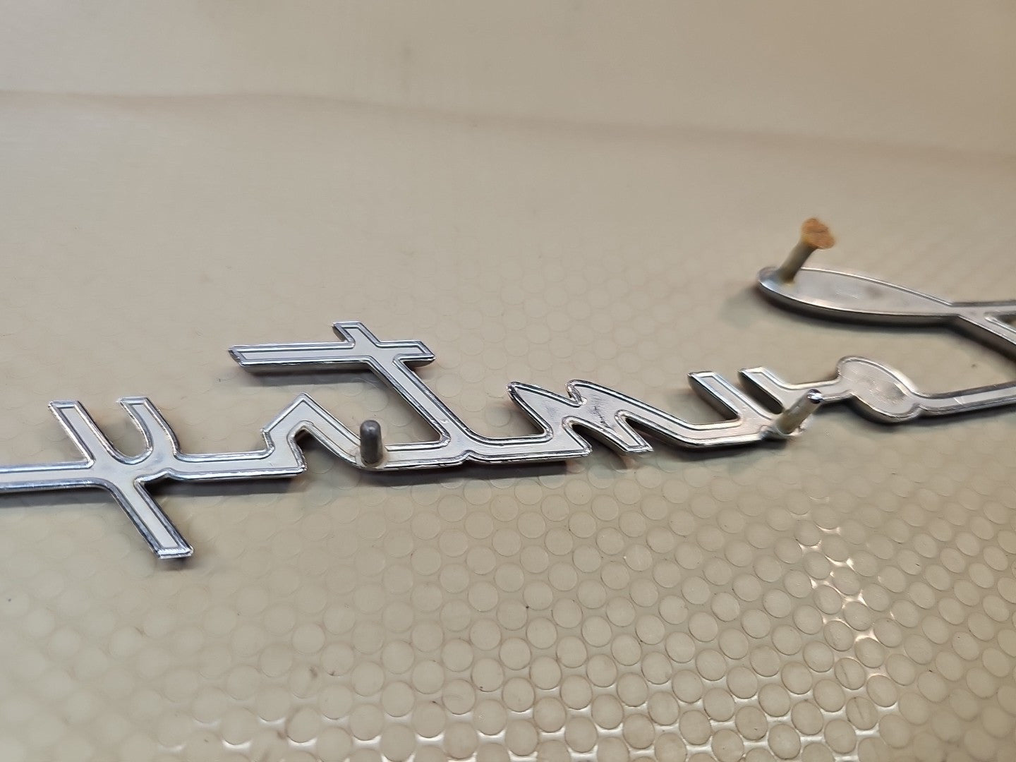 OEM! Rambler Cross Country tailgate emblem for early 60's Rambler