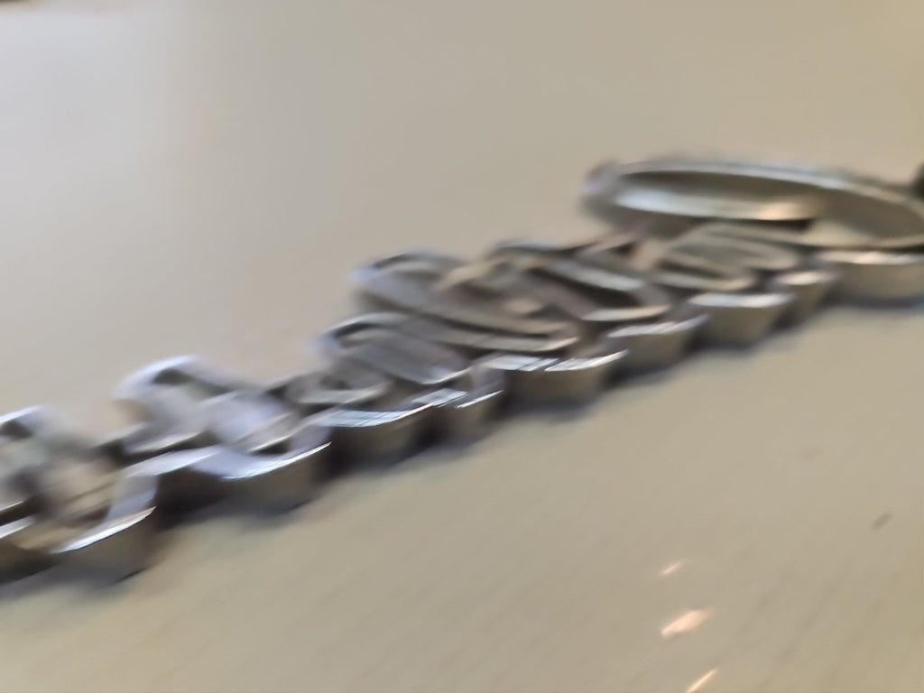 Original 1969 Oldsmobile Cutlass script emblem 399503 - Vintage OEM Badge