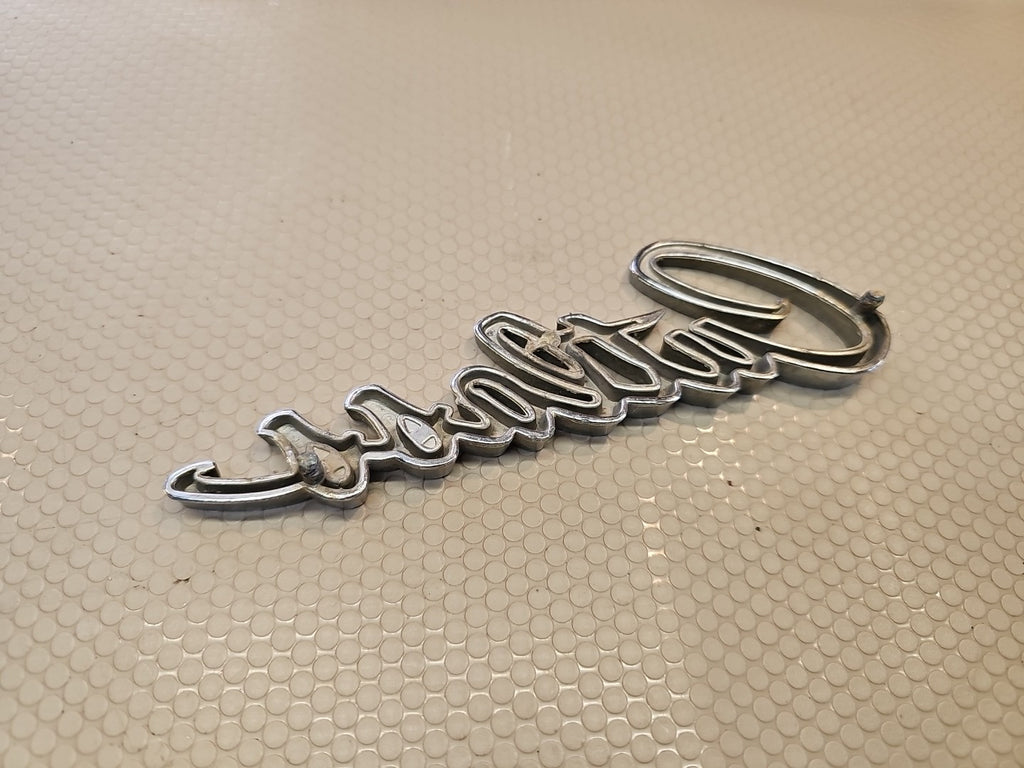 Original 1969 Oldsmobile Cutlass script emblem 399503 - Vintage OEM Badge